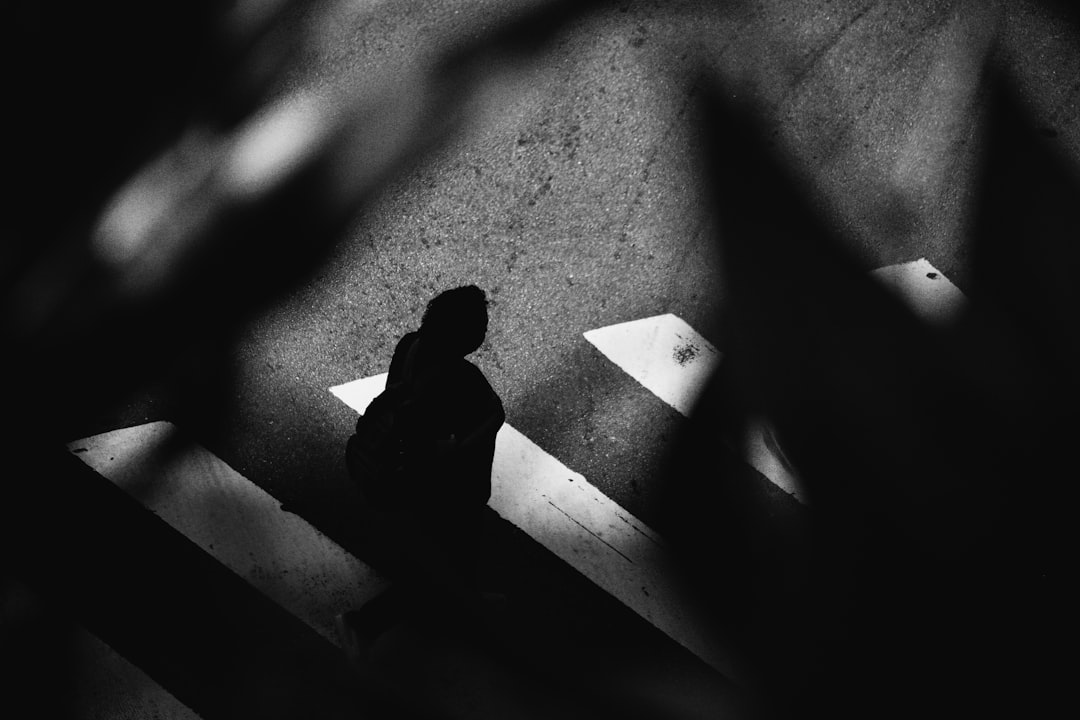 Shadow of a person standing alone